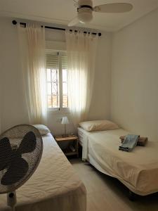 As017 Castillo 3-Bedroom San Juan de Los Terrerosにあるベッド