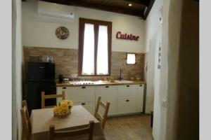 Kuchyň nebo kuchyňský kout v ubytování Casa Cabiria