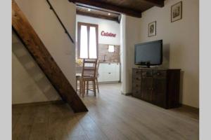 TV a/nebo společenská místnost v ubytování Casa Cabiria + 6 fotografií