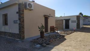 a house with a speaker on the side of it at Casita de Piedra in Trinidad
