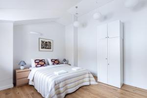 En eller flere senge i et værelse på Twin apartments 3 Bedr by Reside Baltic