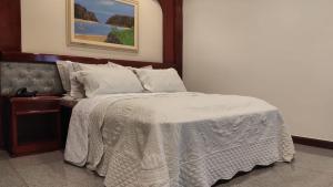 Katil atau katil-katil dalam bilik di Maxim Plaza Hotel