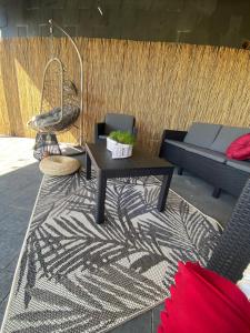 Posezení v ubytování Appartement Blanc cocooning