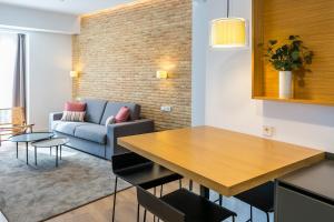 Posezení v ubytování Aquitania Home Suites