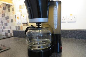 a coffee maker sitting on top of a counter at Jenny's Farm Cottage, Giant's Causeway in Dunseverick