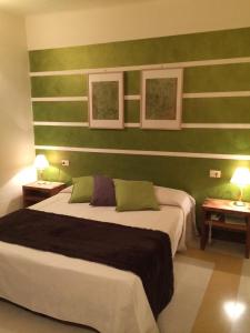 Letto o letti in una camera di Hotel Al Convento