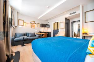 Кровать или кровати в номере Residence Les Boulevards