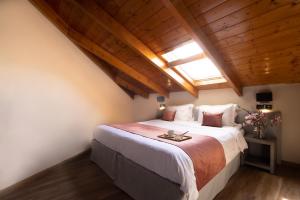 Postel nebo postele na pokoji v ubytování Akti Hotel Ioannina