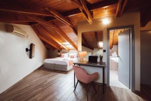 Postel nebo postele na pokoji v ubytování Akti Hotel Ioannina