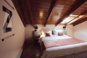 Postel nebo postele na pokoji v ubytování Akti Hotel Ioannina