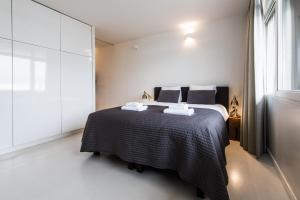 Postel nebo postele na pokoji v ubytování Houthavens Apartments