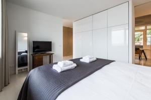 Postel nebo postele na pokoji v ubytování Houthavens Apartments