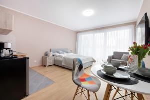 Posteľ alebo postele v izbe v ubytovaní Kasprowicza 20 Uzdrowisko by Jantar Apartamenty Kołobrzeg