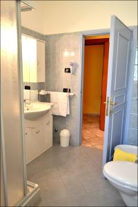 Koupelna v ubytování Hotel Anfora