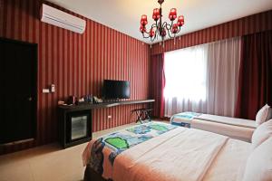 Uma cama ou camas num quarto em Fun Trip - Little Castle & Oscar B&B