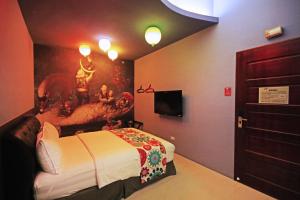 Uma cama ou camas num quarto em Fun Trip - Little Castle & Oscar B&B