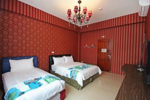 Uma cama ou camas num quarto em Fun Trip - Little Castle & Oscar B&B
