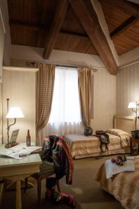 Giường trong phòng chung tại Hotel Selva Candida