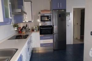 Virtuvė arba virtuvėlė apgyvendinimo įstaigoje BEACH HOUSE Guadalmar