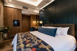 Voodi või voodid majutusasutuse Hotel Marquee Medellín toas