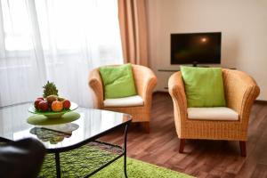 TV a/nebo společenská místnost v ubytování STADT HOTEL Iserlohn