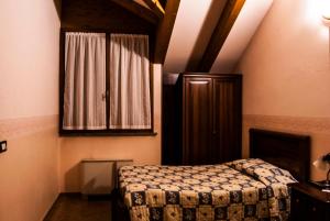 Postel nebo postele na pokoji v ubytování Ristorante Albergo da Giovanni