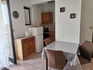 Kuchyň nebo kuchyňský kout v ubytování Apartments Petrica