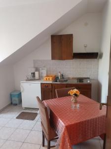 Kuchyň nebo kuchyňský kout v ubytování Apartments Petrica
