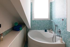 A bathroom at Oskar Home - TRE PONTI Még 18 kép