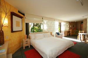 Postel nebo postele na pokoji v ubytování Hotel Casa en el Campo
