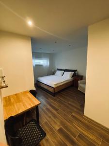 Posteľ alebo postele v izbe v ubytovaní Apartmán Ginko I