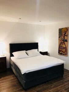 Posteľ alebo postele v izbe v ubytovaní Apartmán Ginko I + 15 fotografií