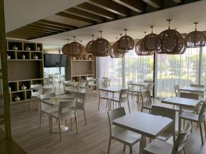 Restaurace v ubytování Motel Okura Villas y Suites