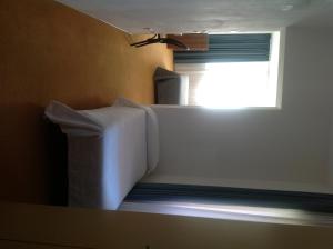 Postel nebo postele na pokoji v ubytování Albergo Al Caminetto