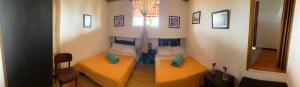 a small room with a table and a bed at Alojamiento Campestre LA PASTORA in Salento +57 photos