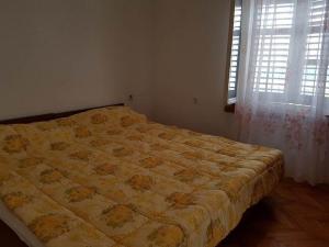 Ένα ή περισσότερα κρεβάτια σε δωμάτιο στο Apartment Jan - 50 m from sea