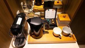 MB GALLERY CHATAN by THE TERRACE HOTELS的咖啡和沏茶工具