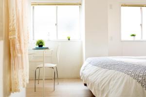 Posteľ alebo postele v izbe v ubytovaní Casa Blanca Guesthouse