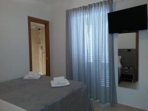 Postel nebo postele na pokoji v ubytování B&B Casa Venezia