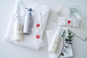 a couple of bottles of shampoo and conditioners on a table at Hiroshima Tokyu REI Hotel in Hiroshima