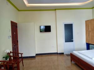 Postel nebo postele na pokoji v ubytování Đức Chính Hotel - Ninh Chu - Phan Rang