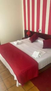 Postel nebo postele na pokoji v ubytování Hostal San Andrés