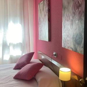 Postel nebo postele na pokoji v ubytování Hostal San Andrés