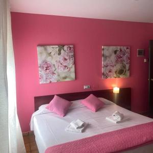 Postel nebo postele na pokoji v ubytování Hostal San Andrés + 37 fotografií