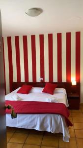 Postel nebo postele na pokoji v ubytování Hostal San Andrés