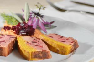 a plate of food with bread and fruit on it at Masseria Il Frantoio in Ostuni