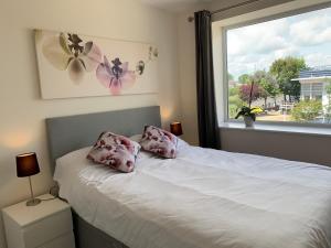 Katil atau katil-katil dalam bilik di Balcony Apartment near Skegness Beach & Town