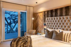 Letto o letti in una camera di Das Kohlmayr Superior