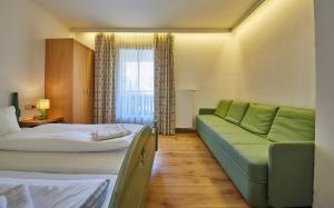 Postel nebo postele na pokoji v ubytování TownHouse Appartements