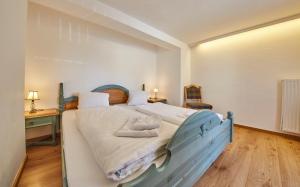 Postel nebo postele na pokoji v ubytování TownHouse Appartements
